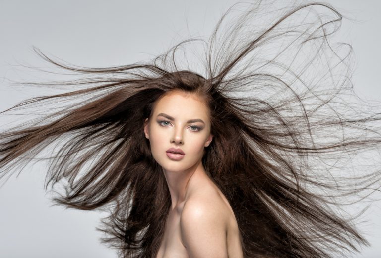 face-beautiful-woman-with-long-brown-hair-posing-studio